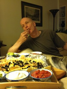 Jinx trying to convince Ray that Nachos are good for dogs! 