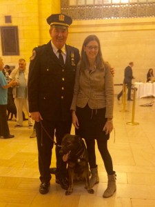Lt. John Kerwick, his recent graduate K-9 Seabee, a German Shepherd, and me. 
