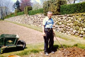 Emery the estate worker who helped with the big burn prepares the garden
